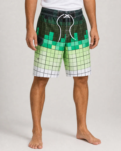 Green gradient plaid knee-length swim shorts, front view.