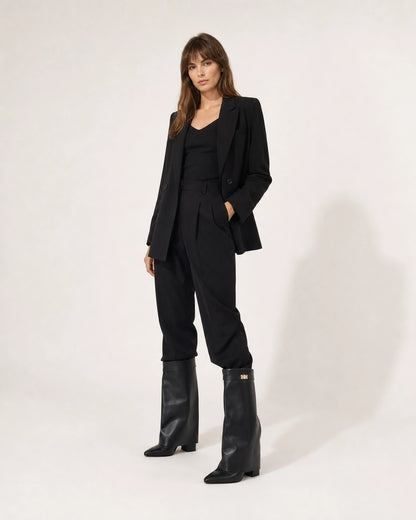 Women's black leather-effect wide-shaft knee-high boots, hero view.